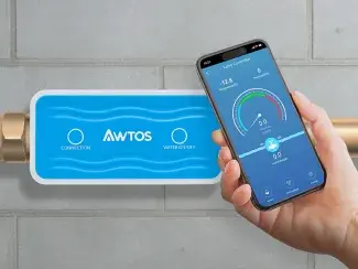 AWTOS App opened on phone in front of AWTOS Water Turn-Off Valve