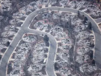 A neighborhood destroyed by a wildfire