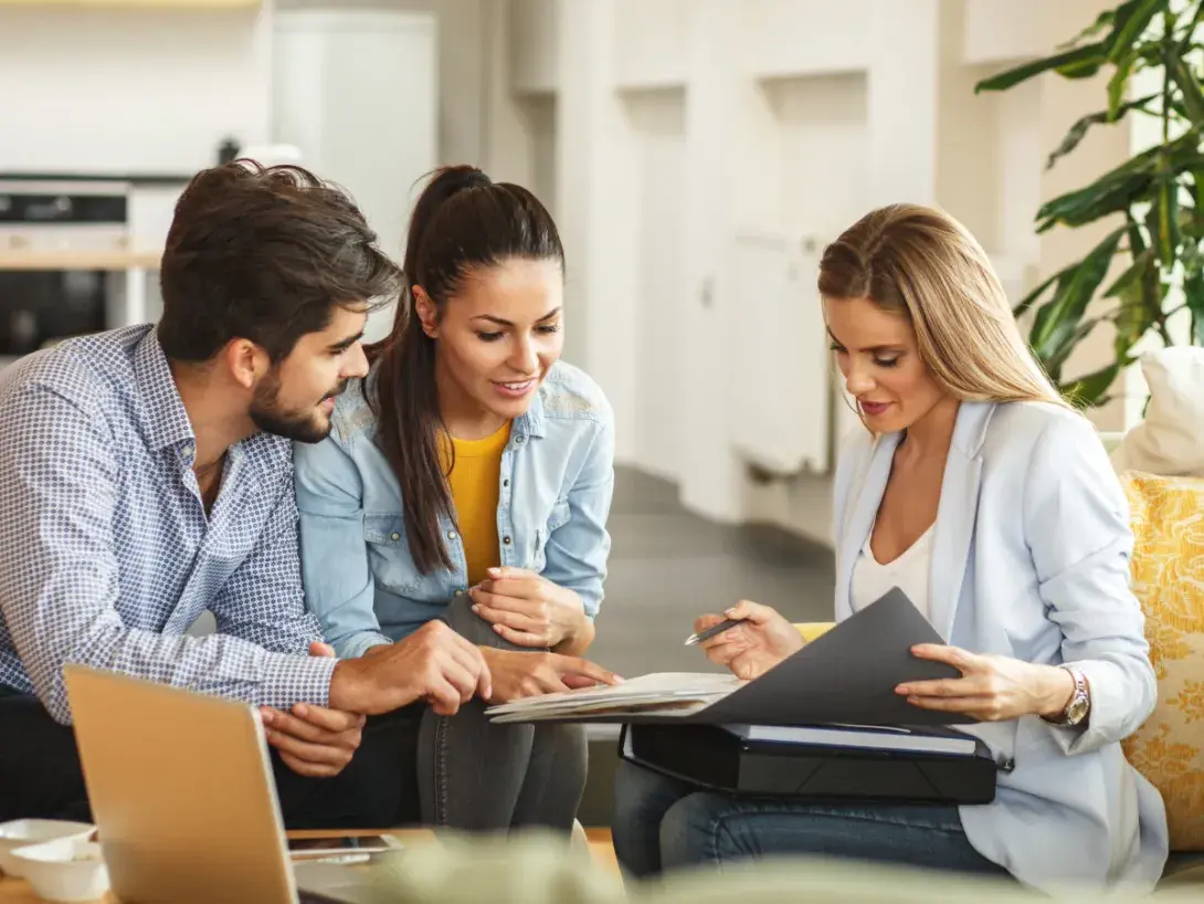 Agent showing policy to homeowners